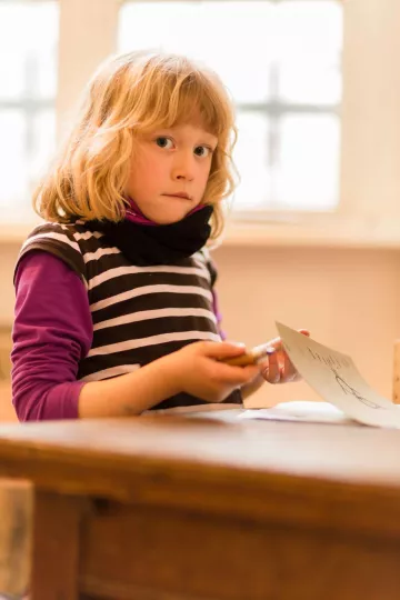 Ein Buchkind bei der Arbeit.